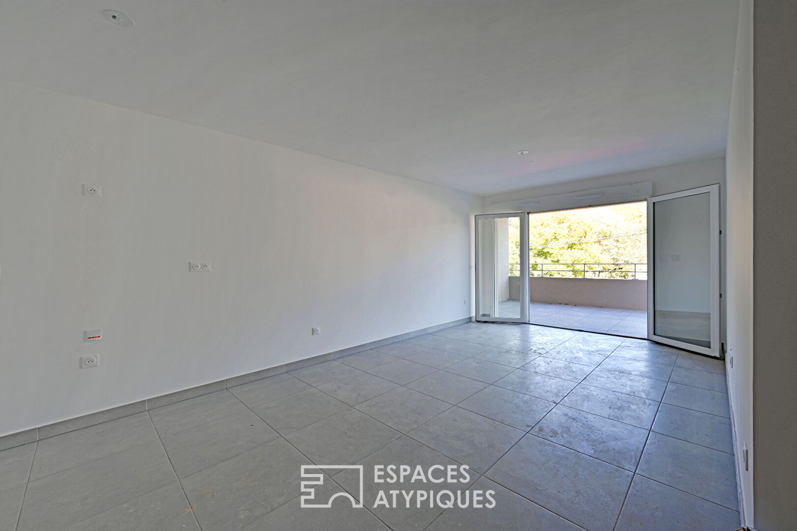 Appartement P2 avec terrasse, garage et ascenseur quartier Camplanier