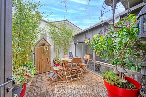 Ancien atelier en coeur de village et sa terrasse