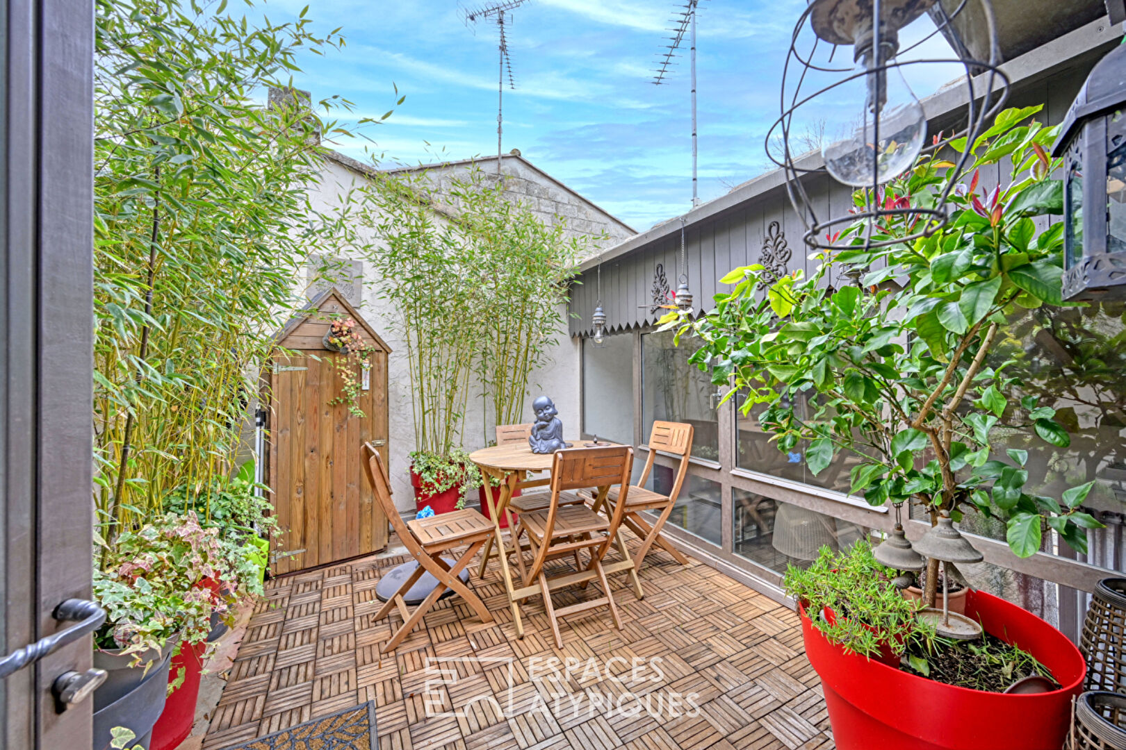 Ancien atelier en coeur de village et sa terrasse