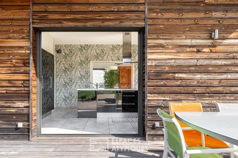 Contemporary oasis with lush garden and swimming pool at the foot of Mont Brouilly