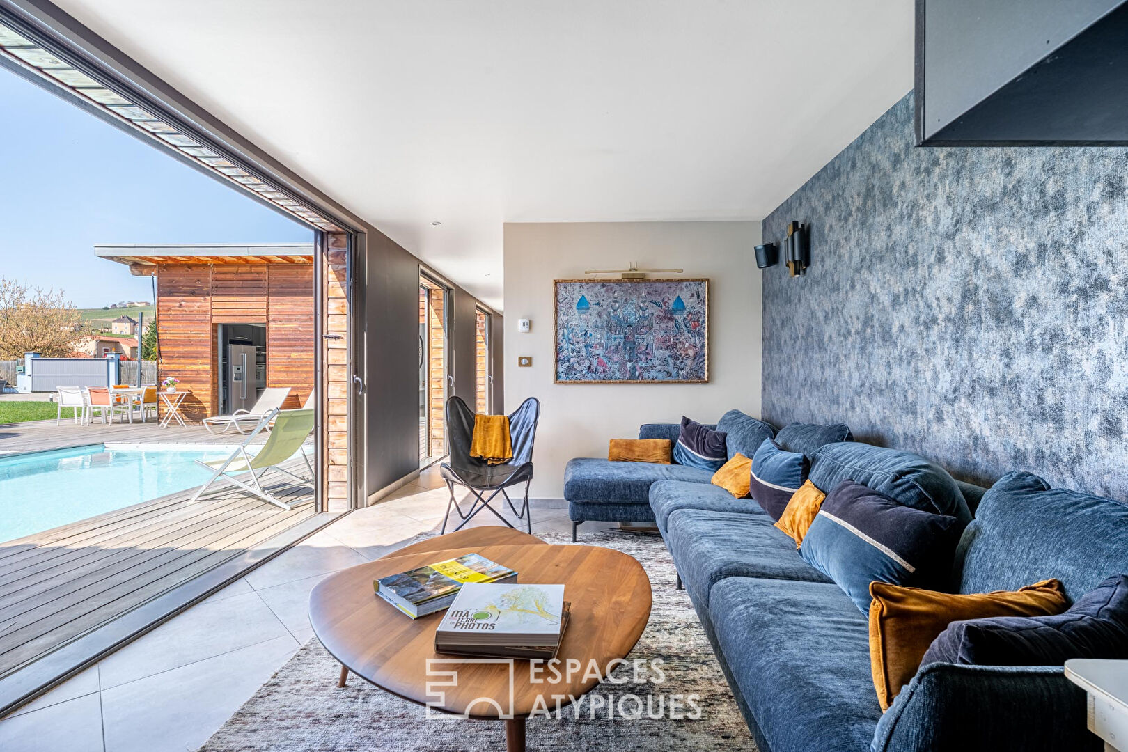 Contemporary oasis with lush garden and swimming pool at the foot of Mont Brouilly