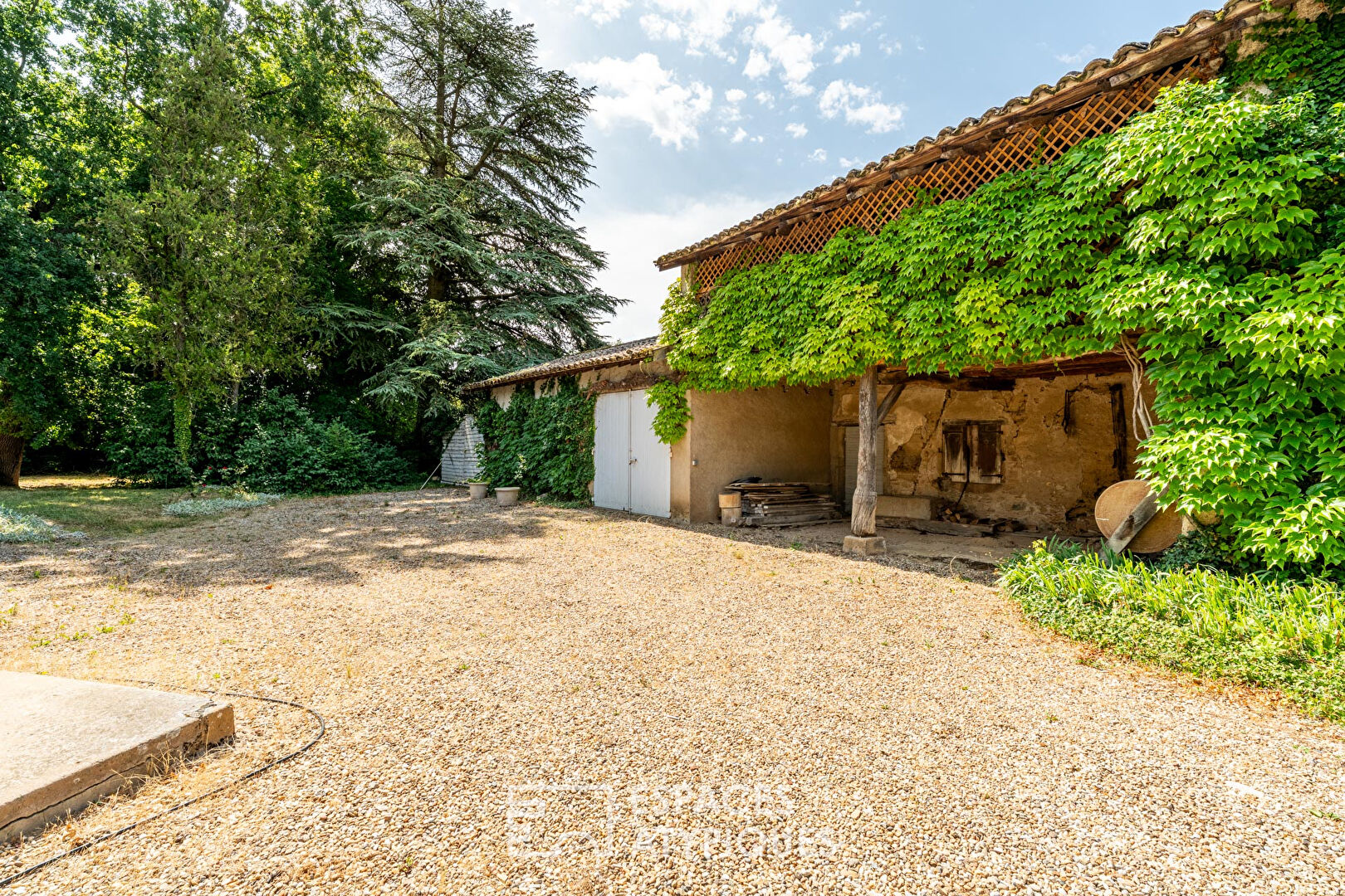 Maison Bourgeoise au coeur d’une ancienne exploitation vigneronne avec parc arboré