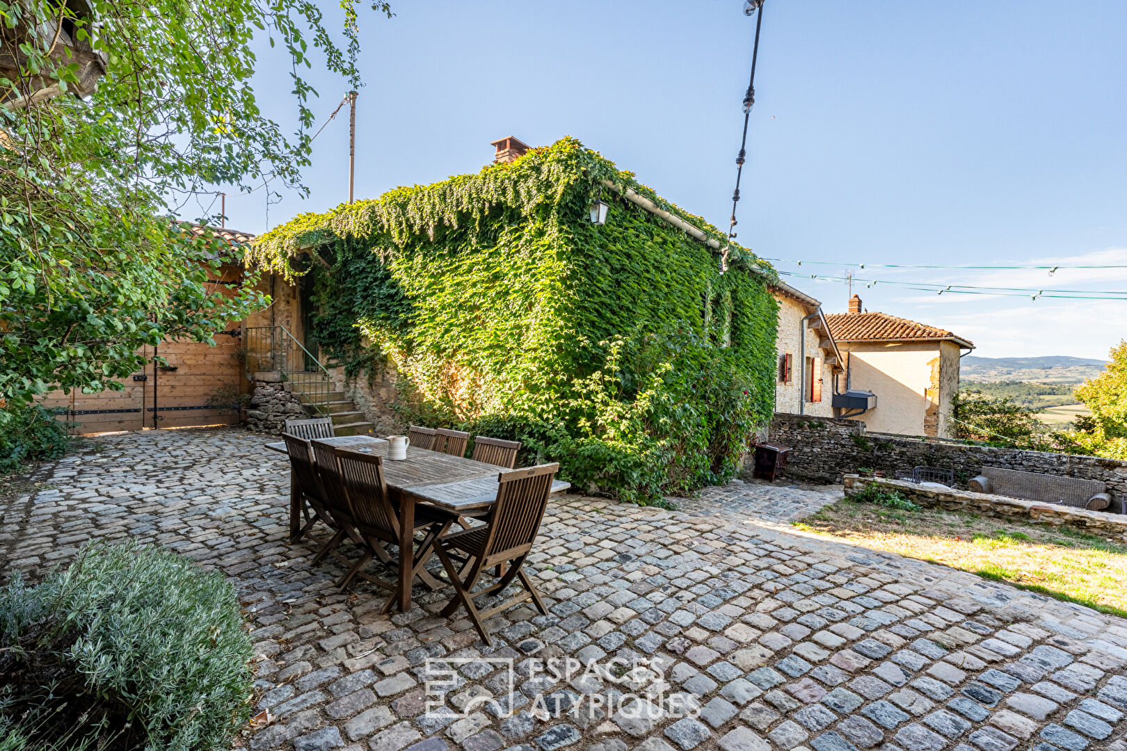 Stone house with outbuilding and exceptional view