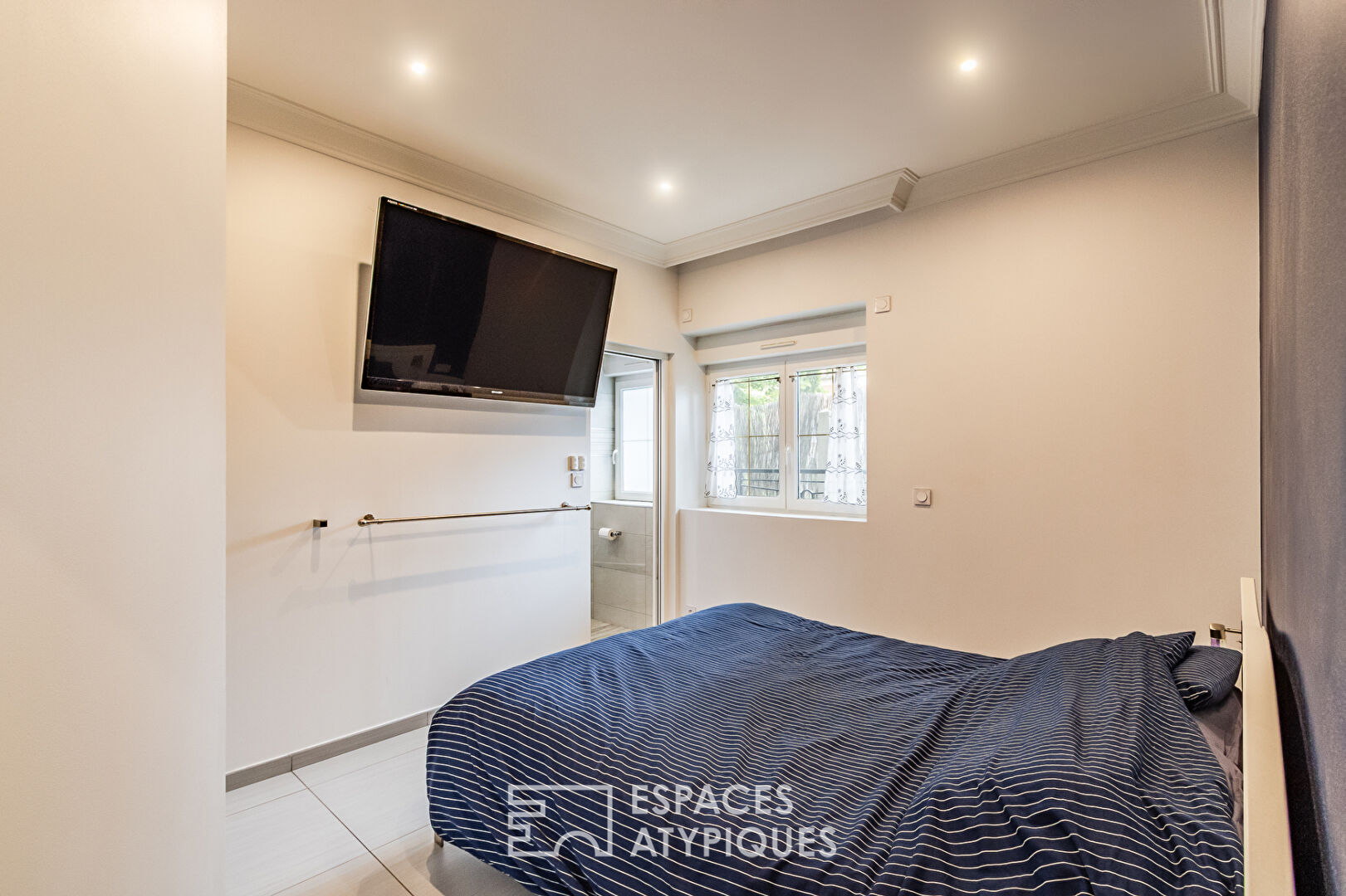 Appartement en rez-de-chaussée avec terrasse, stationnement et garage