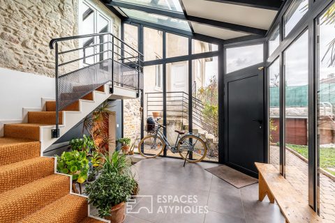 Maison de caractère avec véranda cathédrale et jardin intimiste