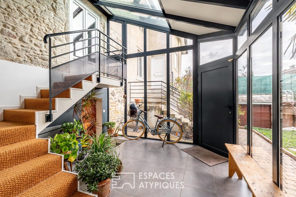 Maison de caractère avec véranda cathédrale et jardin intimiste