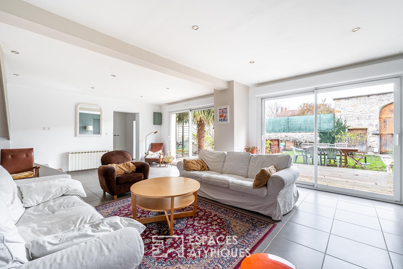 Maison de caractère avec véranda cathédrale et jardin intimiste