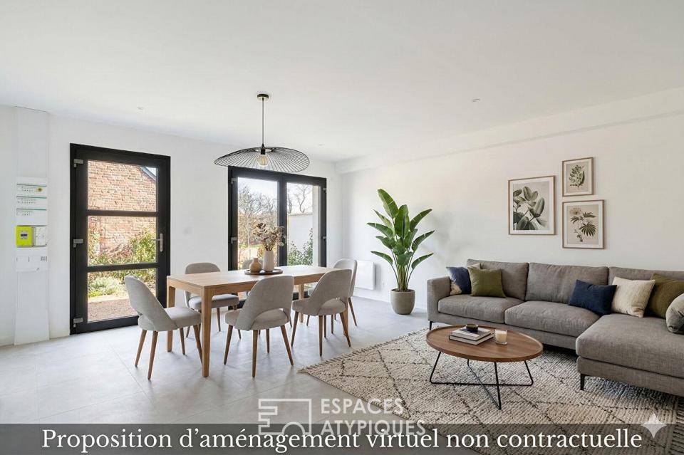 Appartement rez-de-jardin rénové au coeur de Saint-Didier-de-Formans