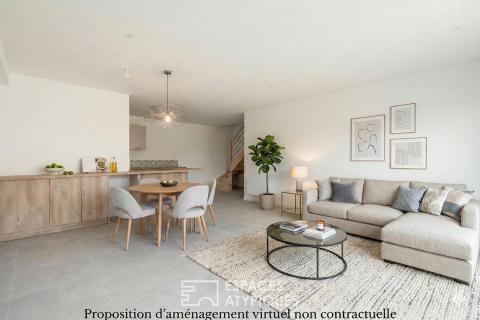 Appartement rez-de-jardin rénové au coeur de Saint-Didier-de-Formans