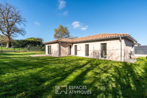 Maison neuve avec jardin et garage