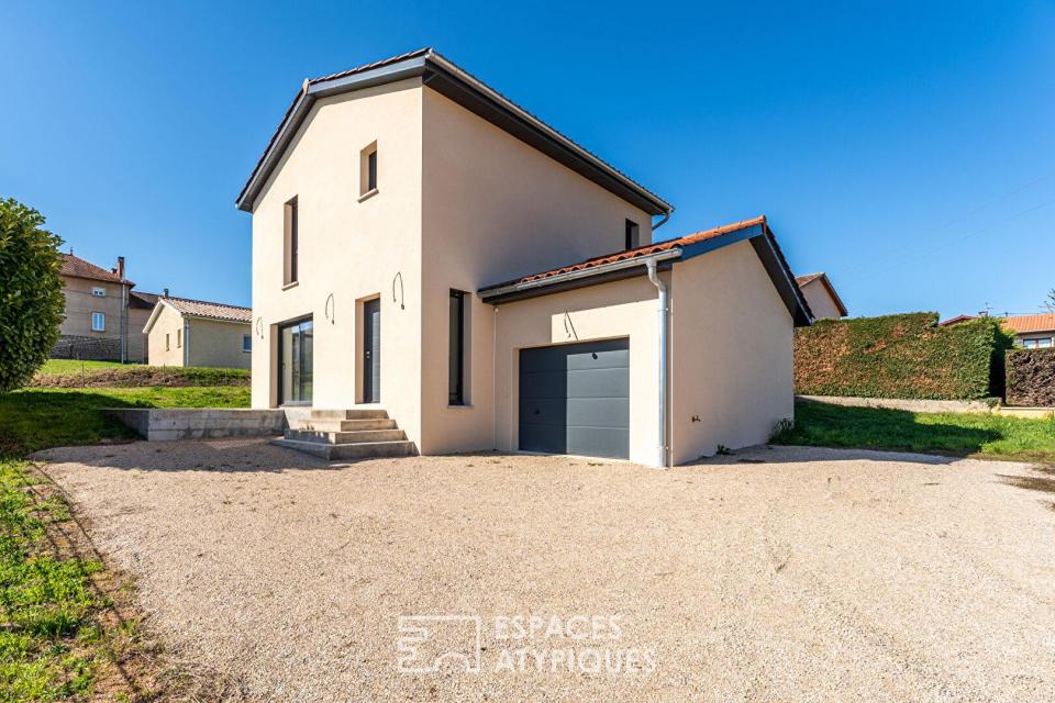 Maison neuve avec jardin et garage