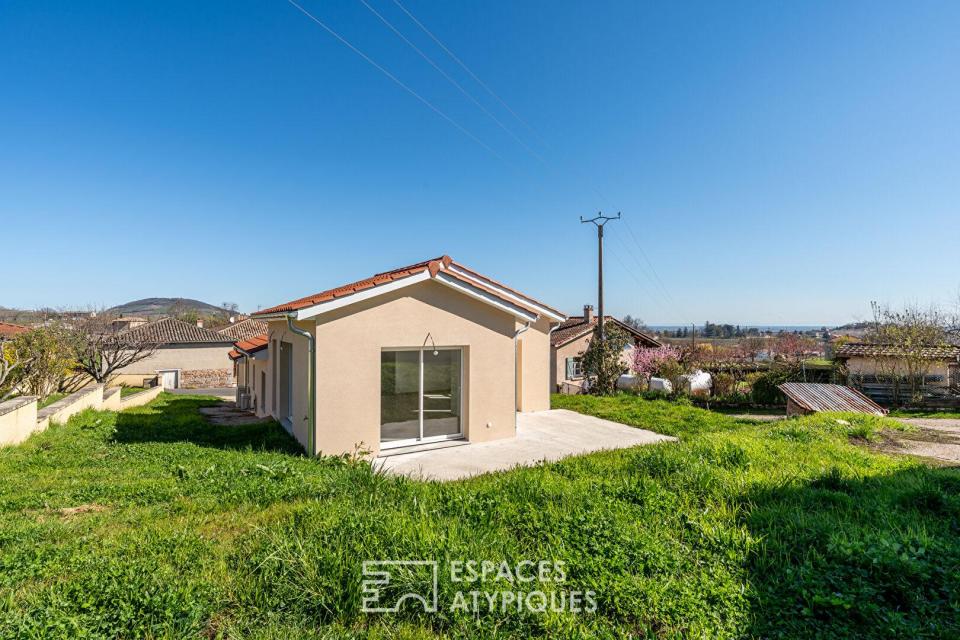 Maison neuve avec jardin et garage