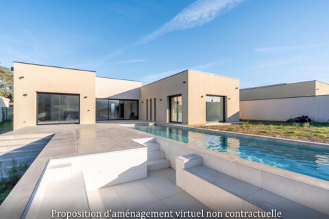 Maison contemporaine de plain-pied avec vue et piscine à débordement