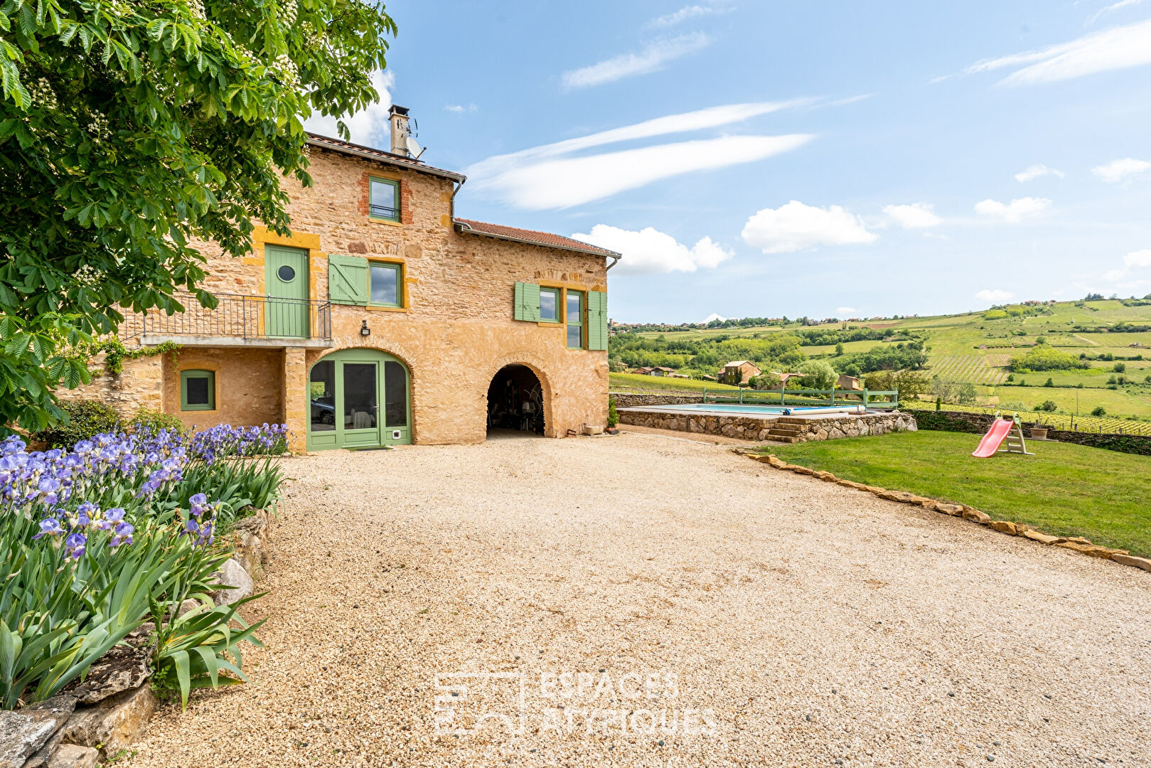 Golden stone house with swimming pool and view