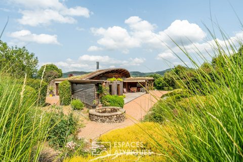 Maison d’architecte éco-responsable de plain pied dans son écrin de verdure avec terrains constructibles