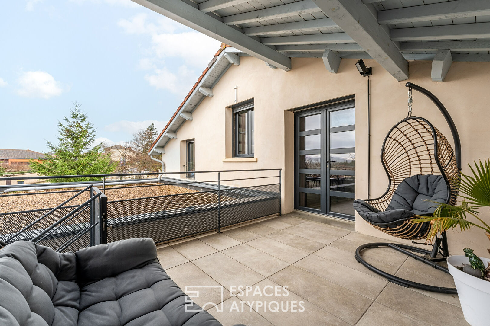 Industrial style apartment with its terrace