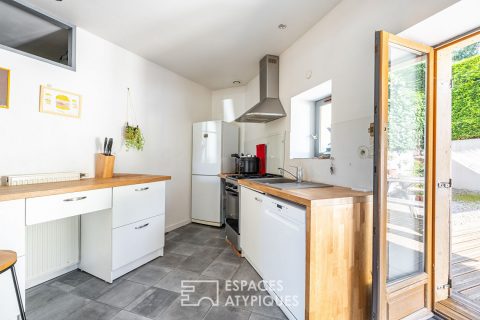 Maison atypique avec sa terrasse plein Sud