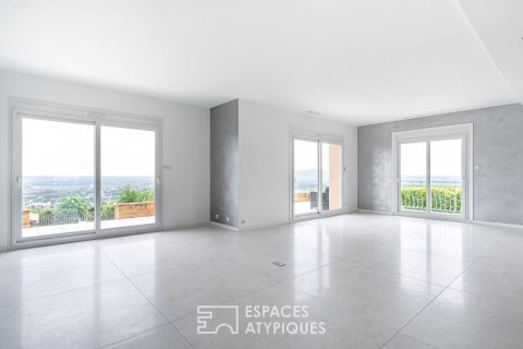 Maison sur les hauteurs d’Anse avec vue panoramique
