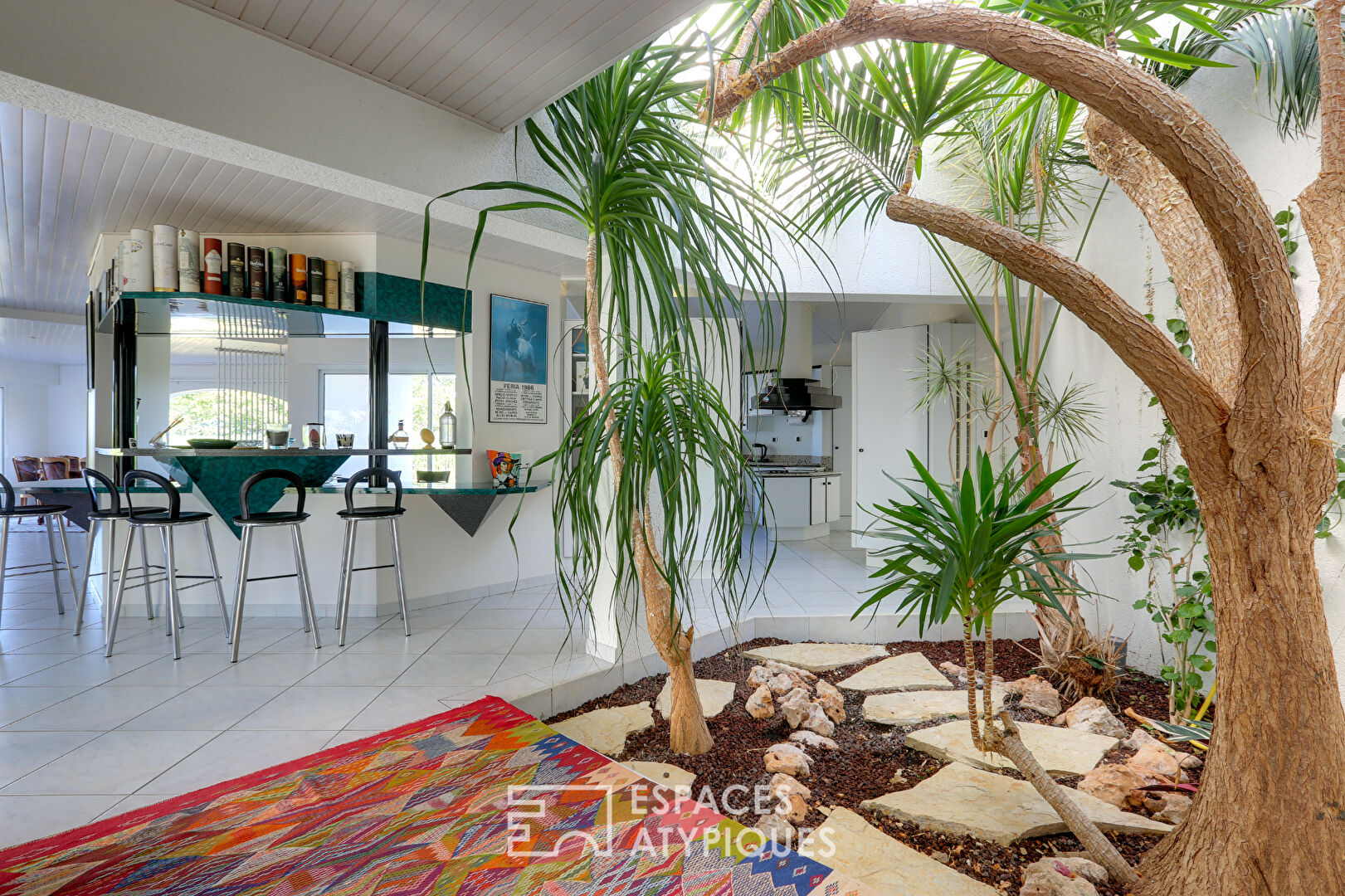 Contemporary star-shaped villa in a green setting