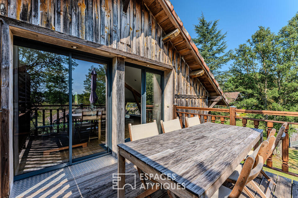 Propriété singulière et ses deux maisons en pleine nature