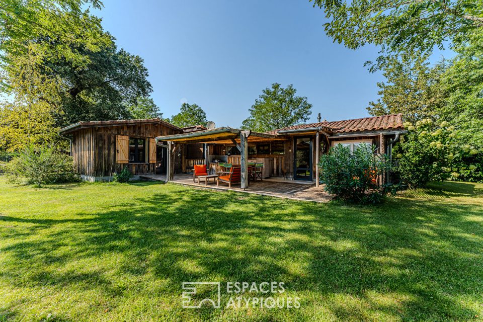Propriété singulière et ses deux maisons en plein nature