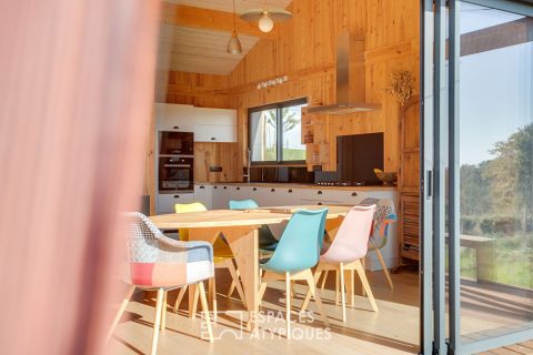 Wooden country house overlooking the Pyrenees mountain range