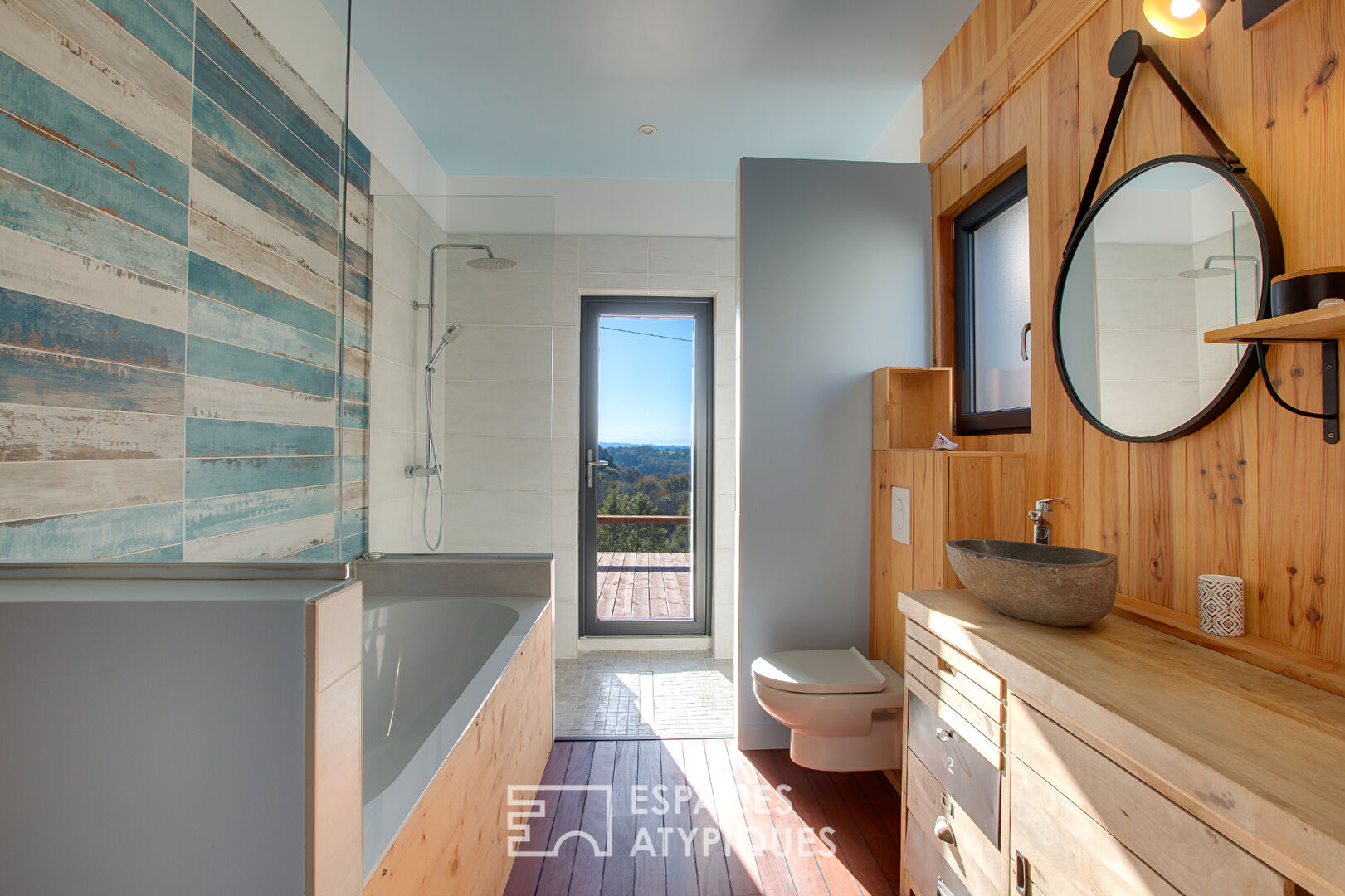 Wooden country house overlooking the Pyrenees mountain range