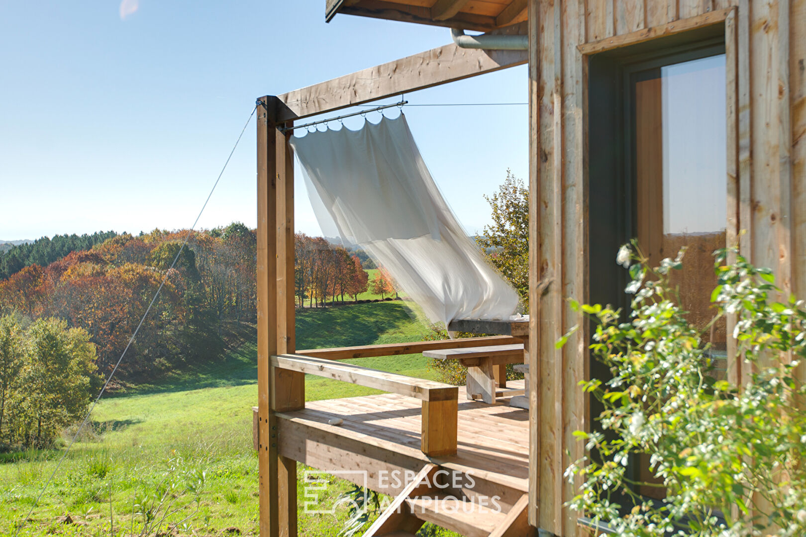 Wooden country house overlooking the Pyrenees mountain range
