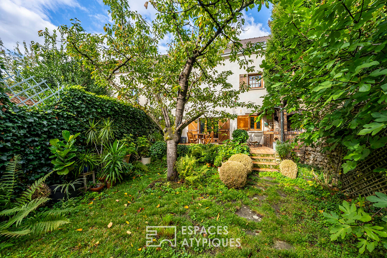 La Maison de ville et son jardin