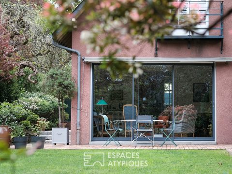 Maison meulière rénovée avec jardin et extensions dans un quartier recherché de Soisy-sur-Seine