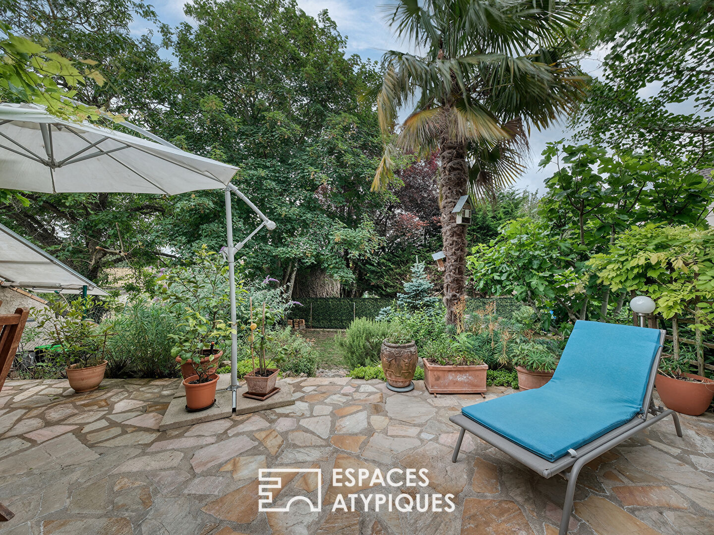 La maison familiale au calme avec sous-sol et jardin verdoyant
