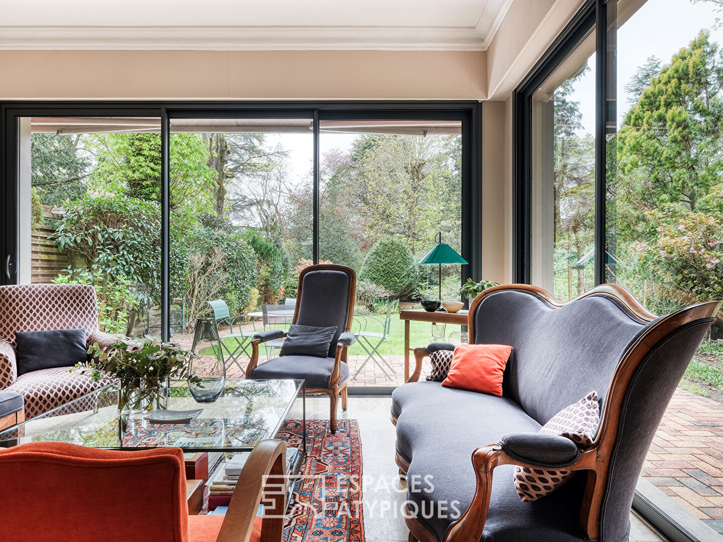 Maison meulière rénovée avec jardin et extensions dans un quartier recherché de Soisy-sur-Seine