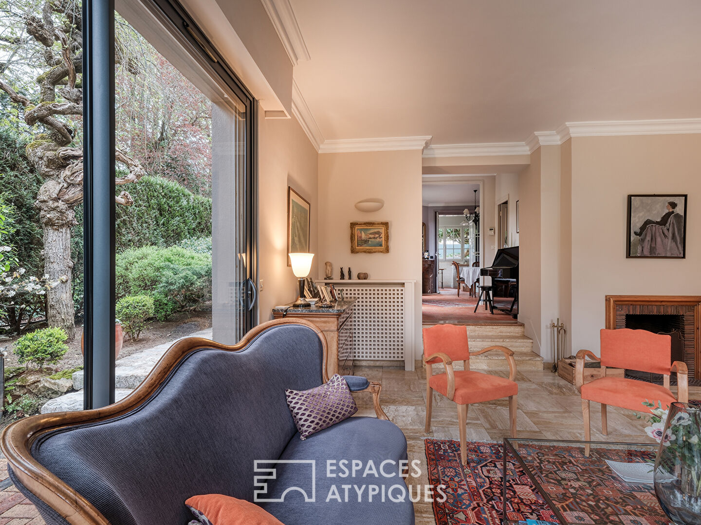 Maison meulière rénovée avec jardin et extensions dans un quartier recherché de Soisy-sur-Seine