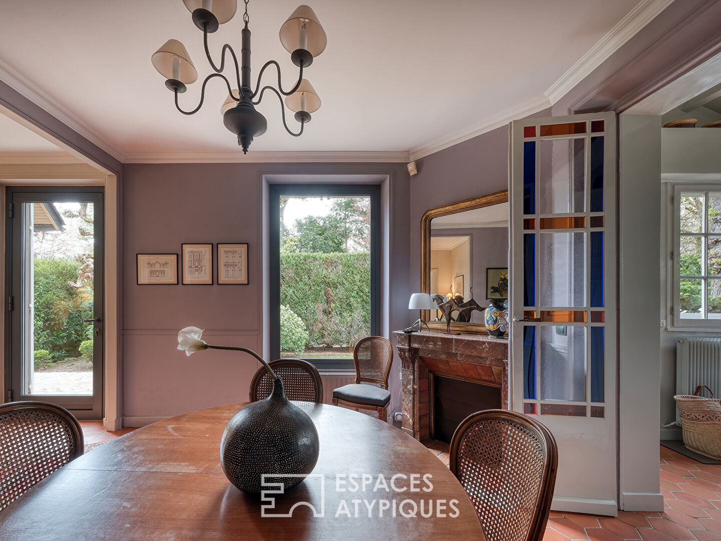 Maison meulière rénovée avec jardin et extensions dans un quartier recherché de Soisy-sur-Seine