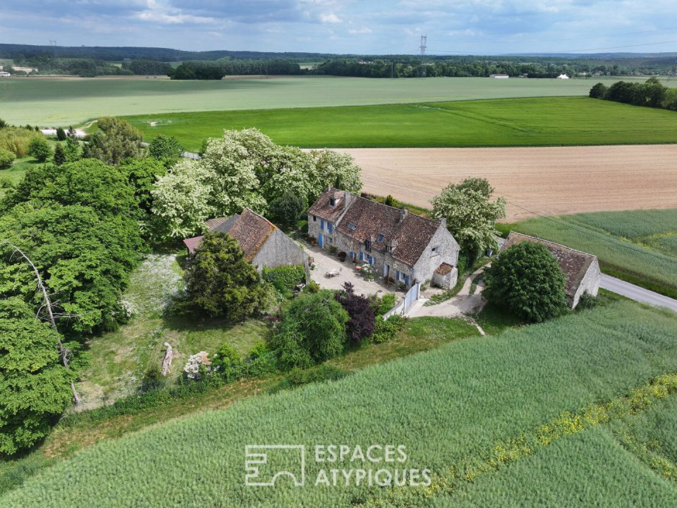 Une ferme de caractère et sa grange à réinventer, au coeur de la nature