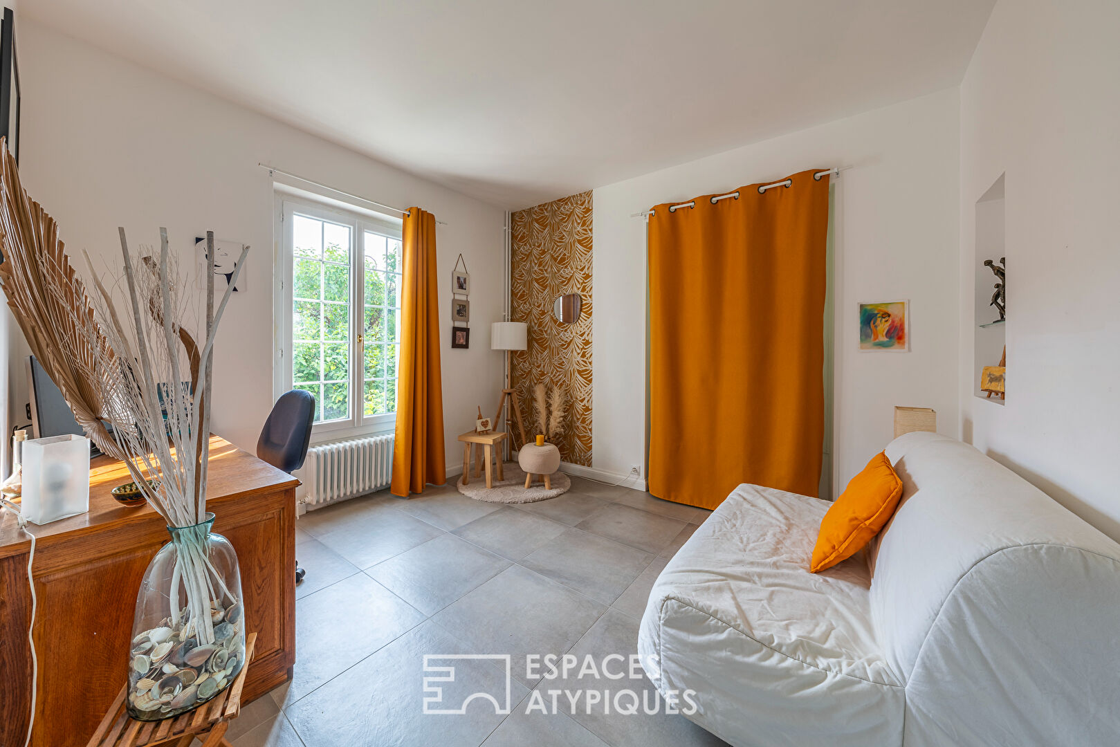Maison bourgeoise rénovée avec vie de plain-pied et jardin en centre-ville
