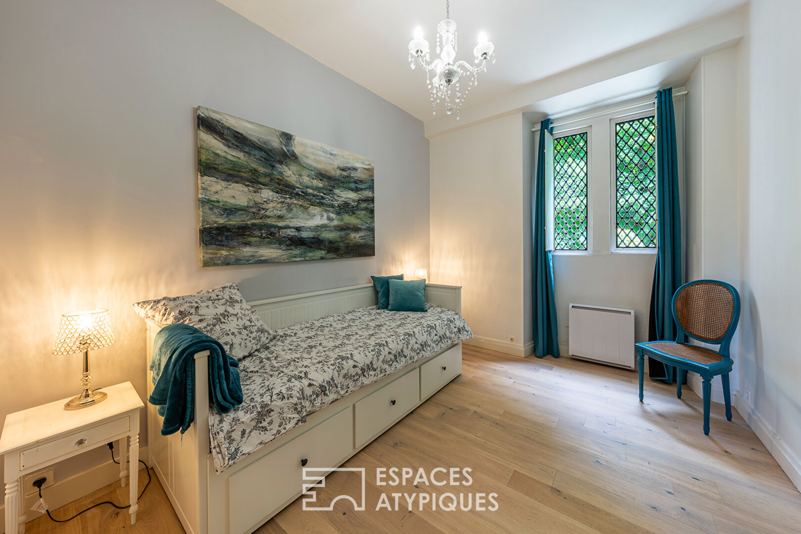 Appartement au coeur d’un ancien moulin rénové et dans un parc arboré.