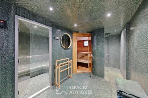 La maison contemporaine avec espace bien être et jardin paysagé