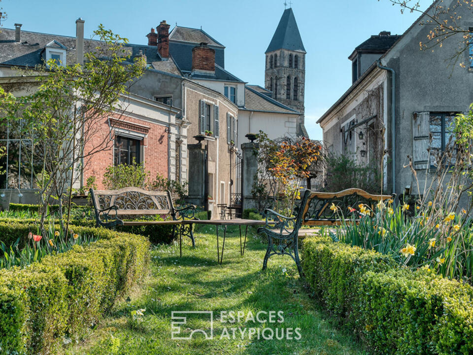 Maison de caractère en coeur de ville avec jardin et dépendances