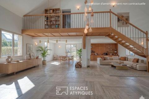 Maison familiale au coeur de la nature avec terrain paysager