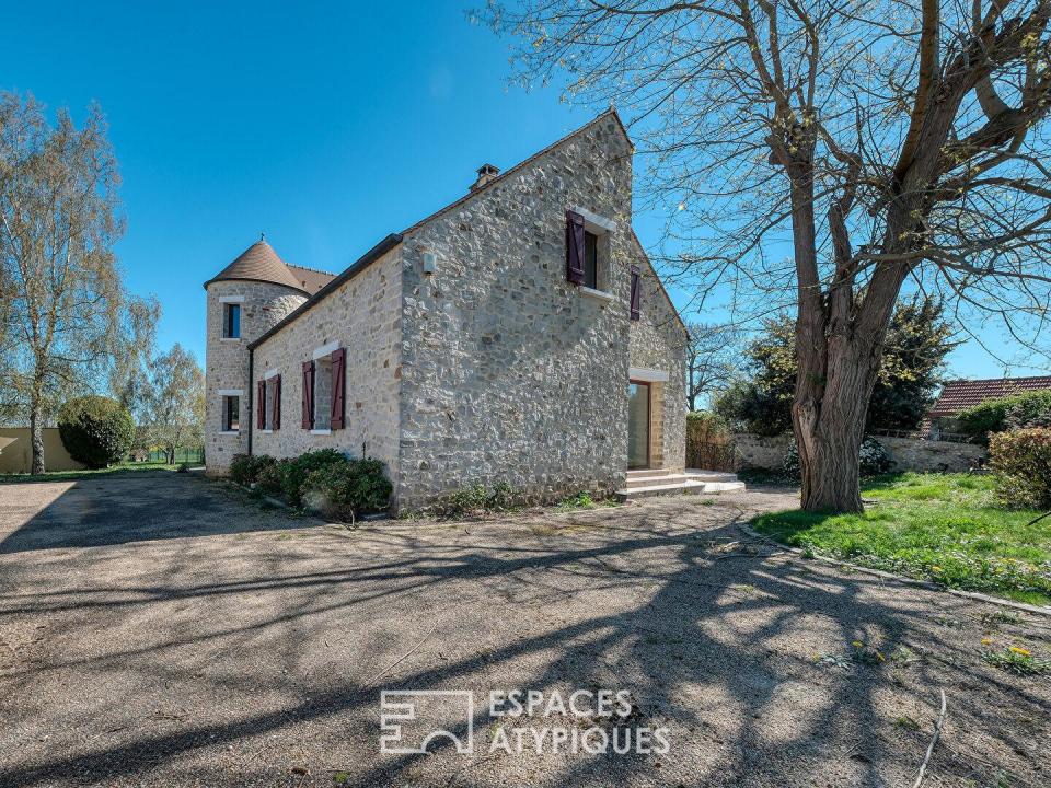 Maison familiale au coeur de la nature avec terrain paysager