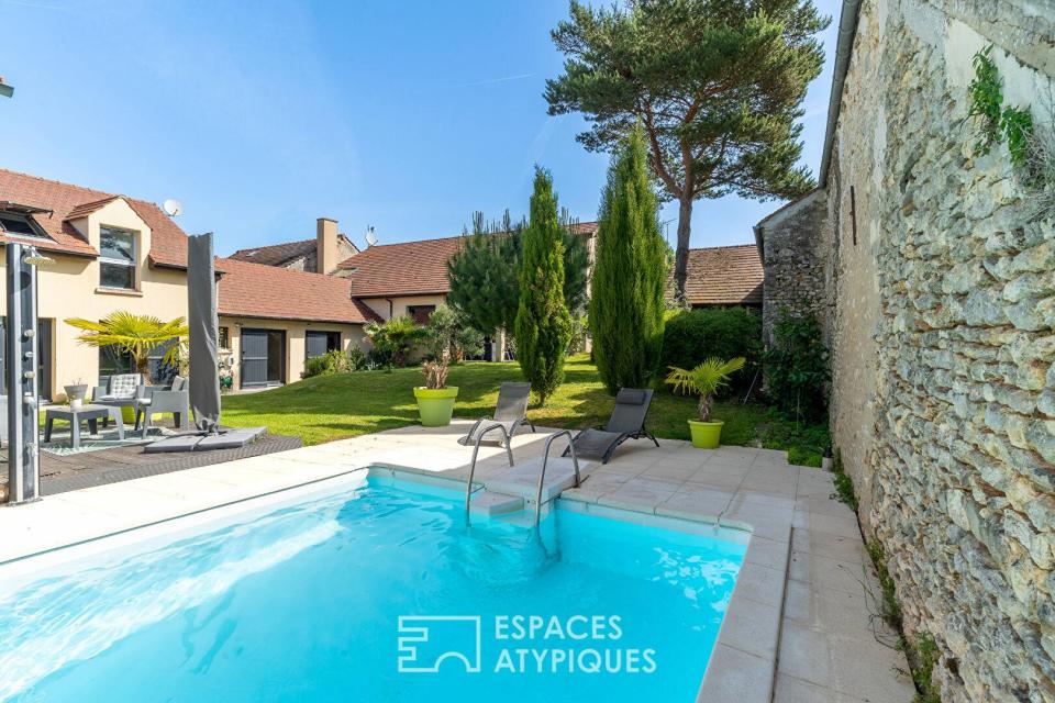 Maison contemporaine avec séjour cathédrale et jardin intimiste proche RER C