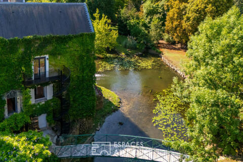Appartement au coeur d&rsquo;un ancien moulin rénové et dans un parc arboré.