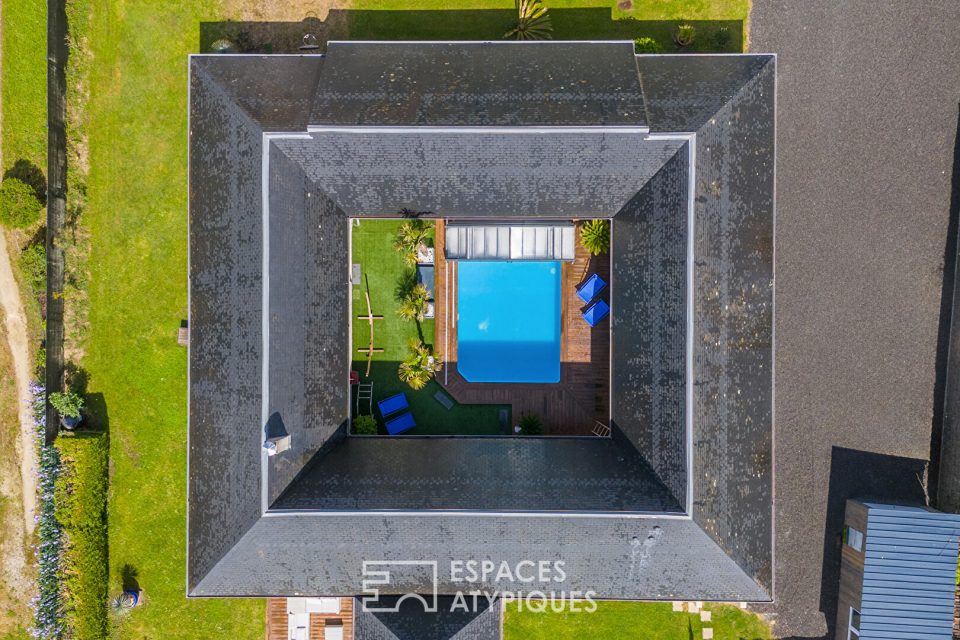 La contemporaine et son patio avec piscine
