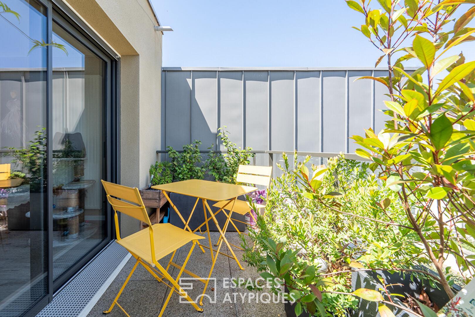 Appartement en dernier étage avec terrasses et parkings