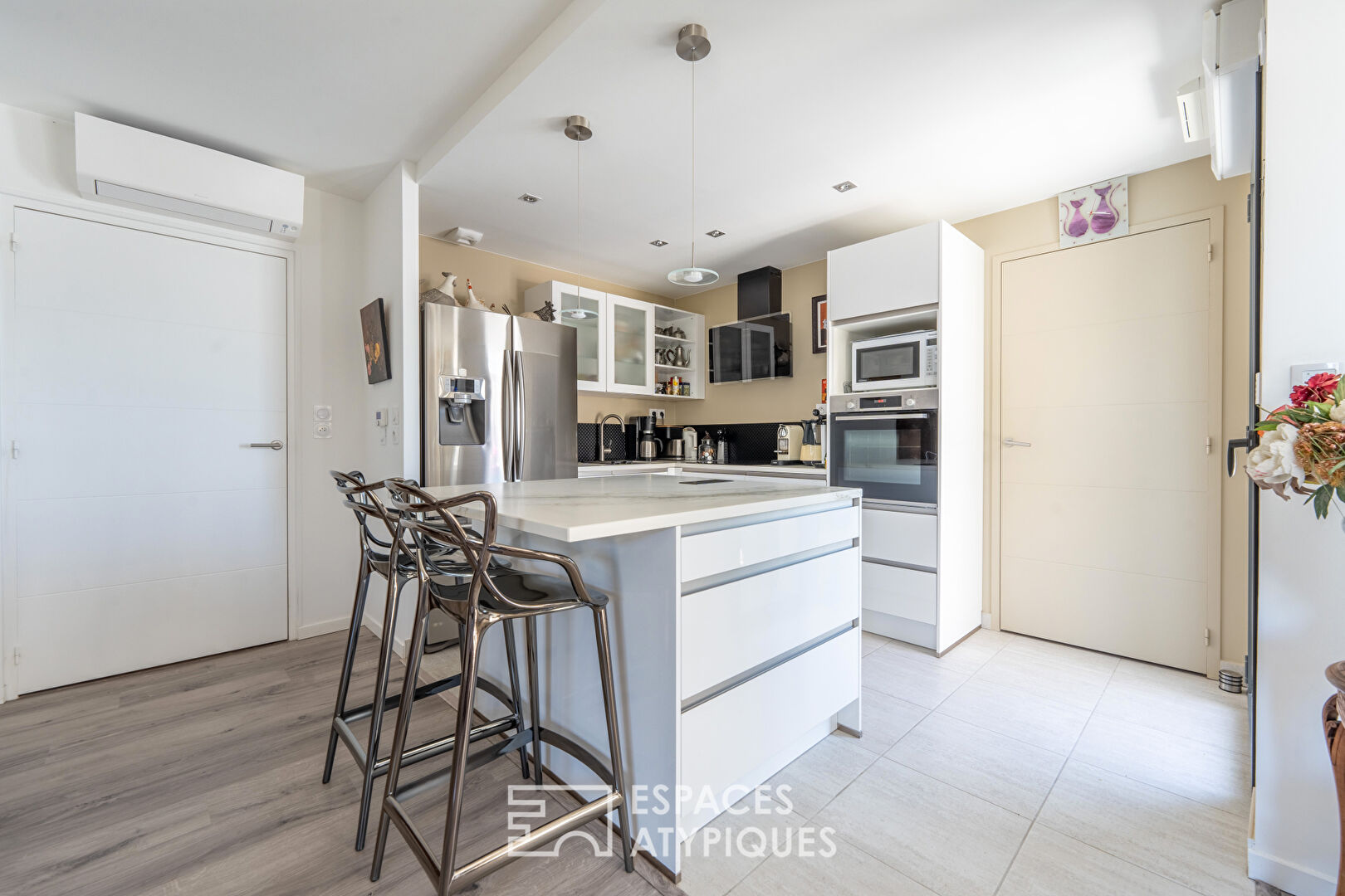 Appartement en dernier étage avec terrasses et parkings