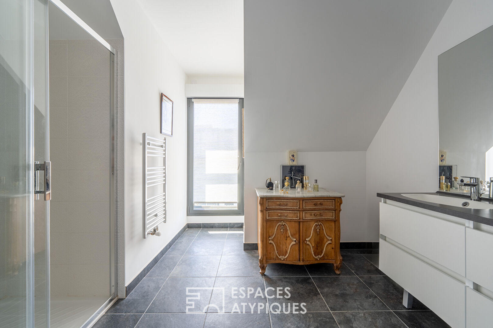 Appartement en dernier étage avec terrasses et parkings