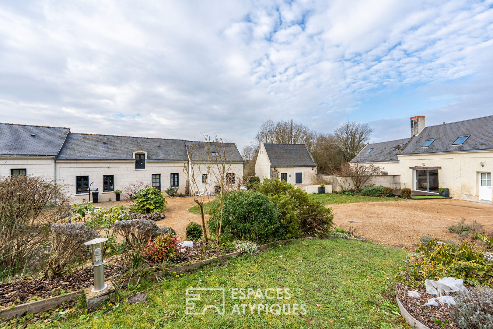Set of character houses with landscaped garden and swimming pool