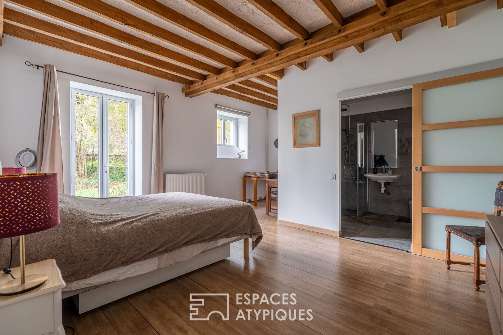 Propriété historique rénovée avec piscine naturelle