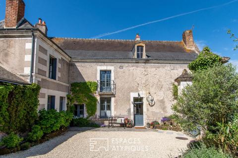 Elegante bâtisse de caractère en coeur de village